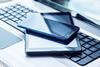 Laptop with tablet and smartphone on white background