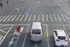 Chinese-man-repainting-road