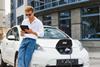 Man with Nissan EV on tablet (1)