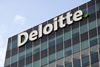 Deloitte reduces partner pay by 17%