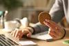 person-eating-cookie-shutterstock_1765695494