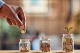 Money-jars-Rido-shutterstock_2341161137