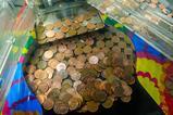 Penny-nudge-machine-shutterstock-2365882099-Stephen-Barnes