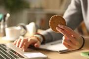 person-eating-cookie-shutterstock_1765695494