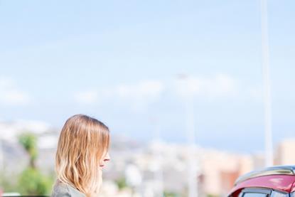Portrait charging_red car