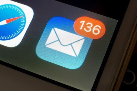 Communication emails Mino Surkala shutterstock_2488628057