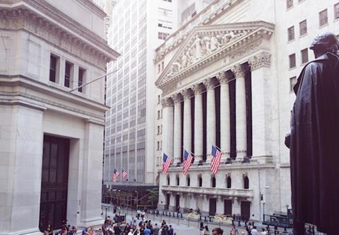 New York Stock Exchange, Wall street on summer morning.