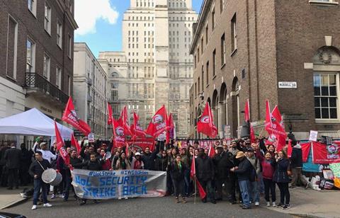 Outsourced staff strike for living wage and equal employment rights