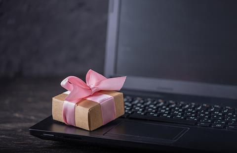 Gift on keyboard shutterstock 1332300227
