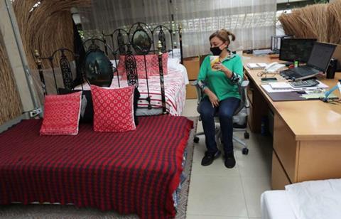 Colombian factory opens bedrooms for employees to live in after reopening 