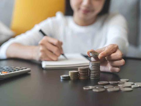 woman counting coins