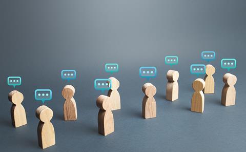 People figures with comment clouds above their heads