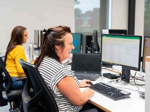 Platform Housing Group employees at desks