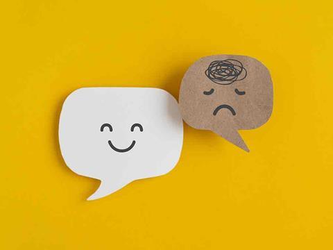 speech bubbles with faces on, symbolising mental health